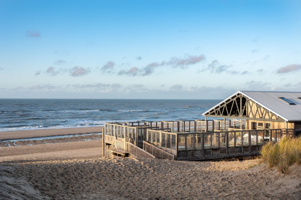 Summer Vibes Beach House Summer Vibes an einem Strand mit Beach House Feeling